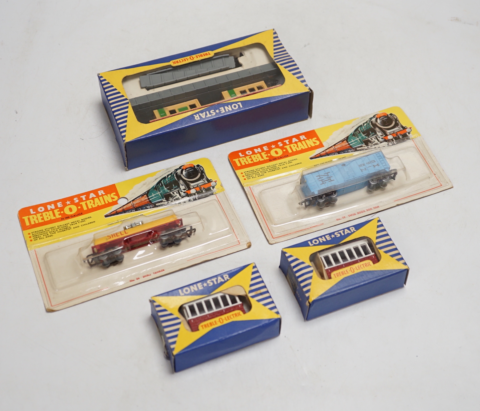 Seventy-two boxed items of Lone Star 000 gauge model railway including; a tunnel, Brake End Coaches, bogie wagons, station platforms, platform extensions, signal boxes, box vans, and telegraph poles